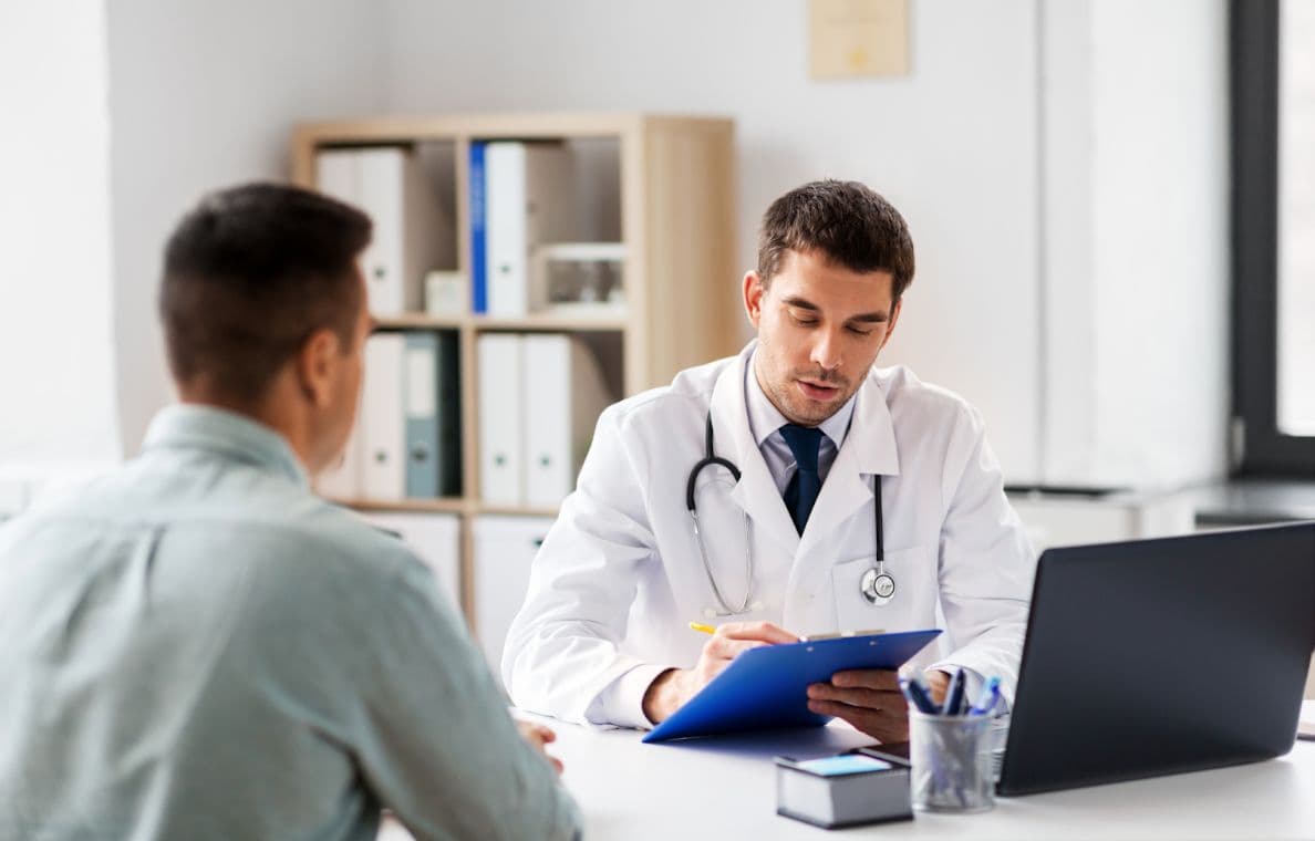 sitting down with a doctor speaking about trt hormone therapy