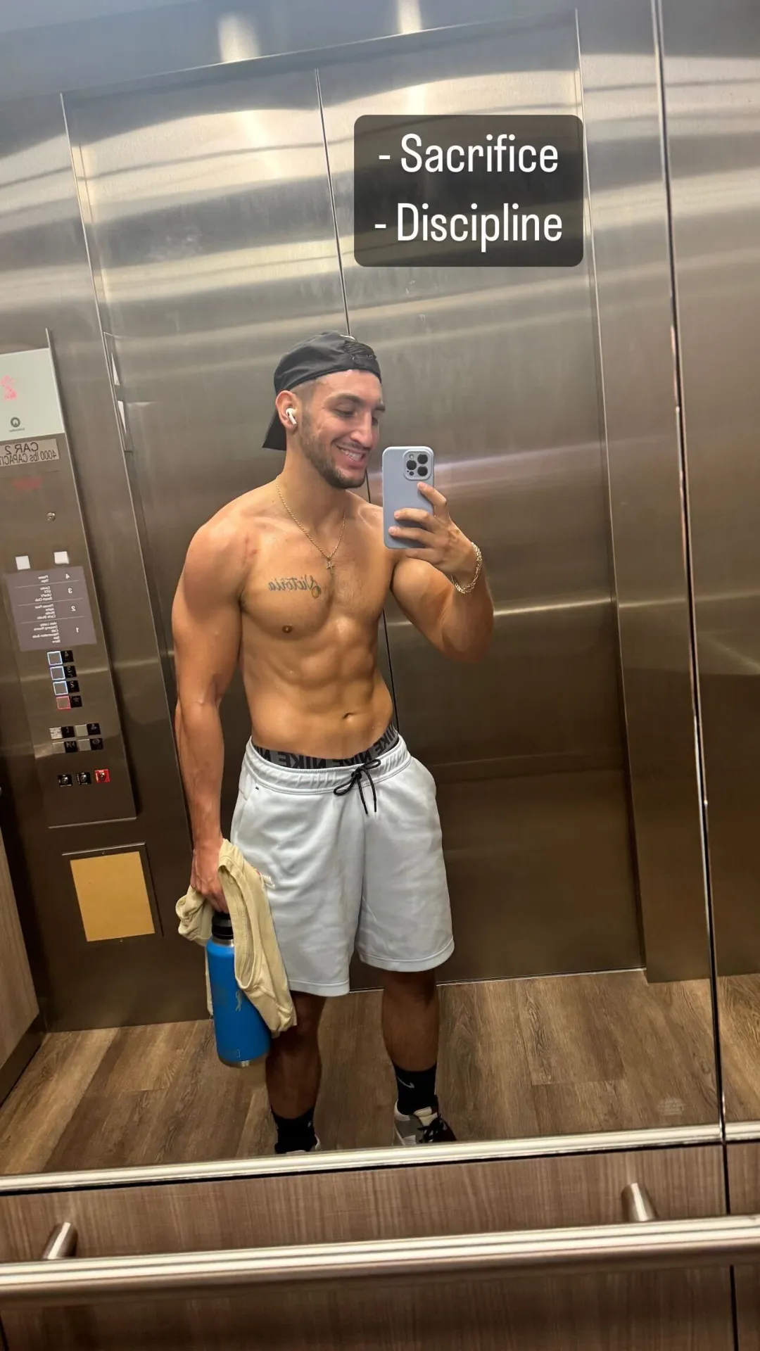 Breanna S. standing in a modern kitchen